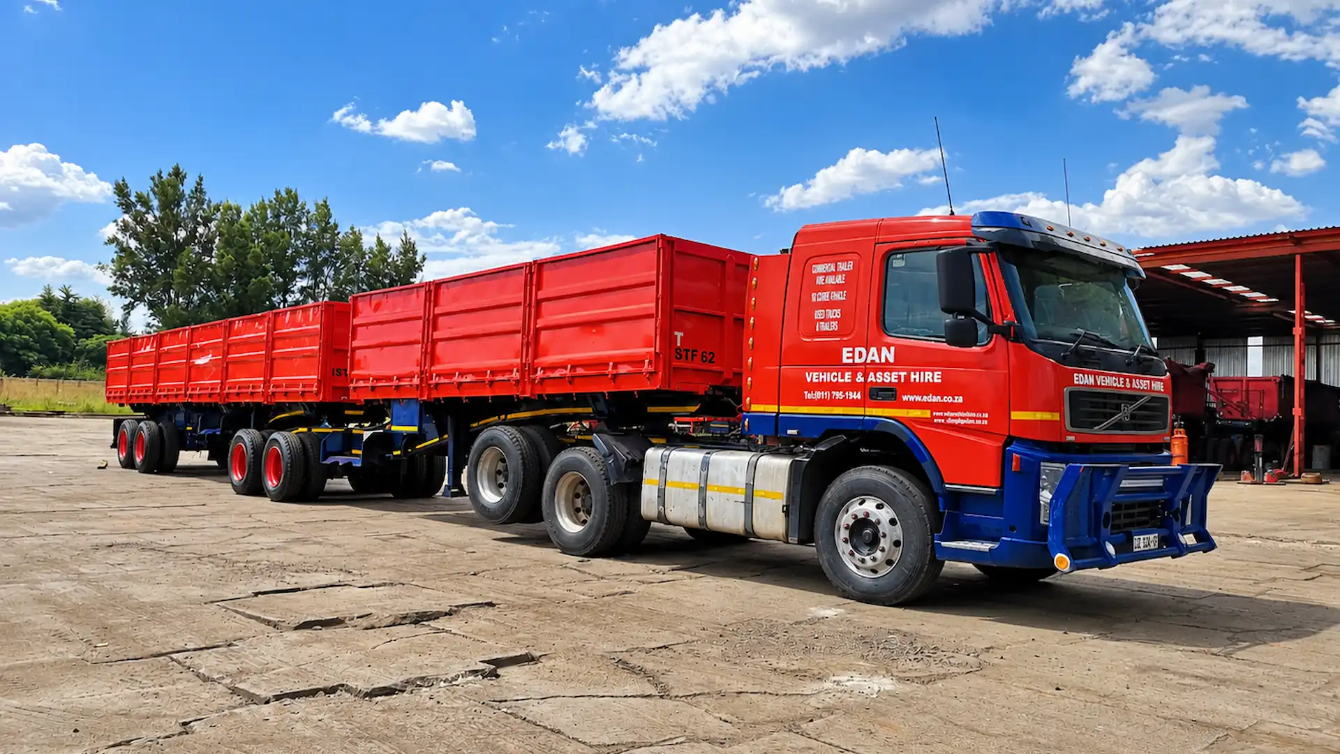 Edan Vehicle & Asset Hire red truck with high-sided dropside Superlink trailers for bulk cargo transport.