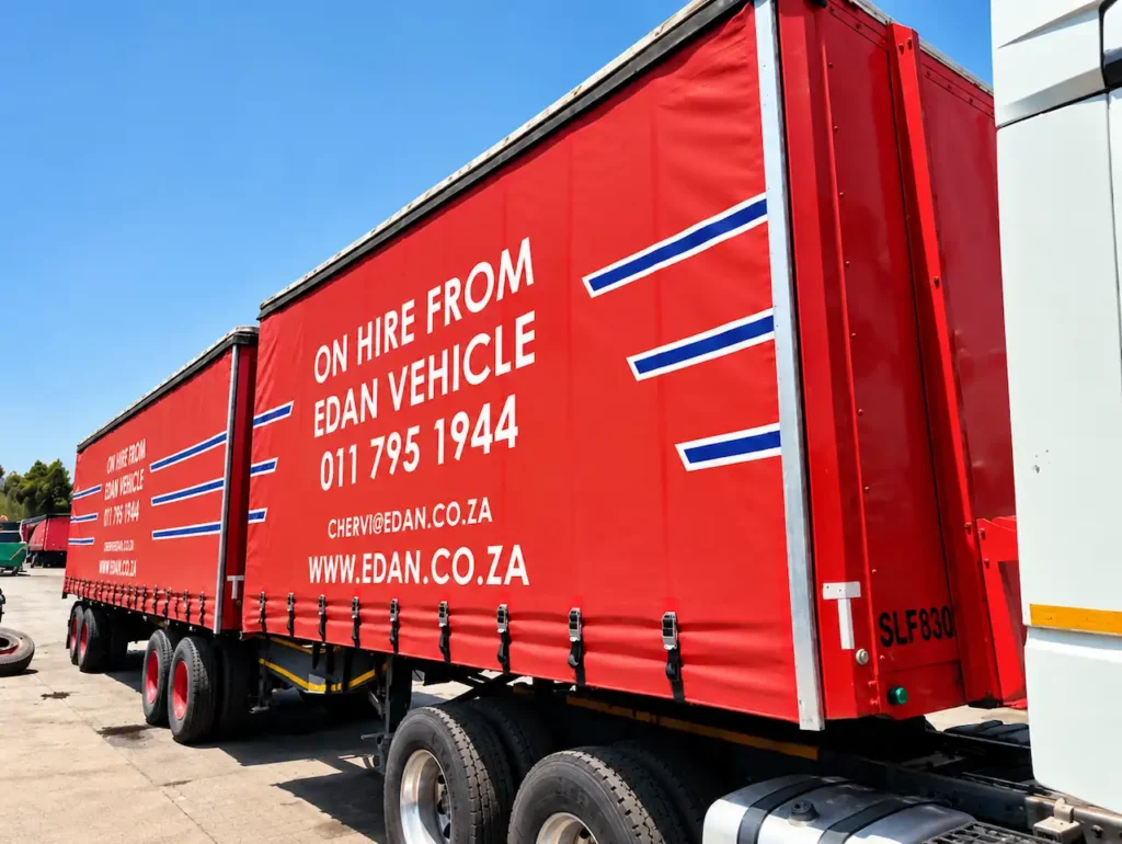Red tautliner trailer for hire from Edan Vehicle & Asset Hire in South Africa.