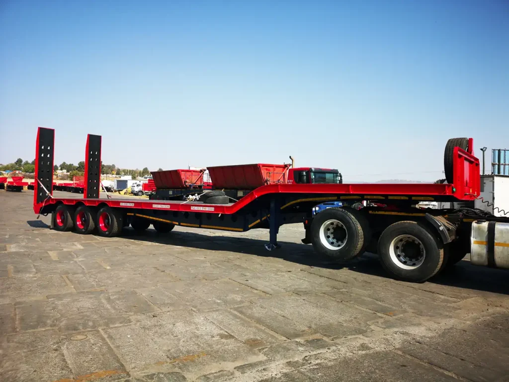 Lowbed trailer for hire in South Africa from Edan Vehicle & Asset Hire, with rear loading ramps for transporting heavy machinery, construction equipment and industrial vehicles.