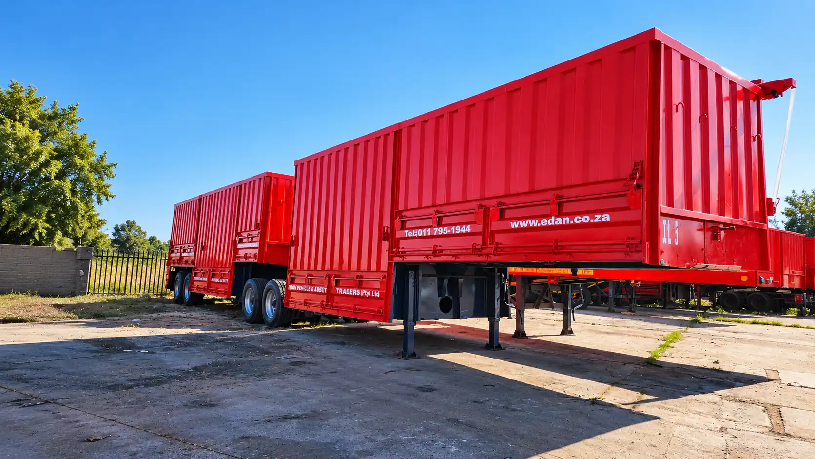 Red interlink grain carrier trailers for hire from Edan Vehicle & Asset Hire in South Africa.